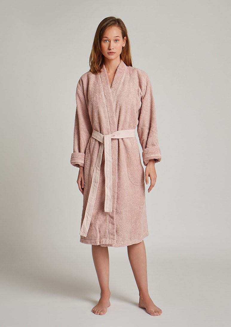 Humana Dusty Pink woman is wearing Humana Dusty Pink bathrobe