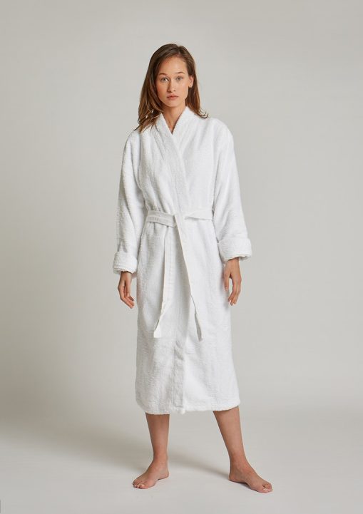 woman is wearing Humana White bathrobe