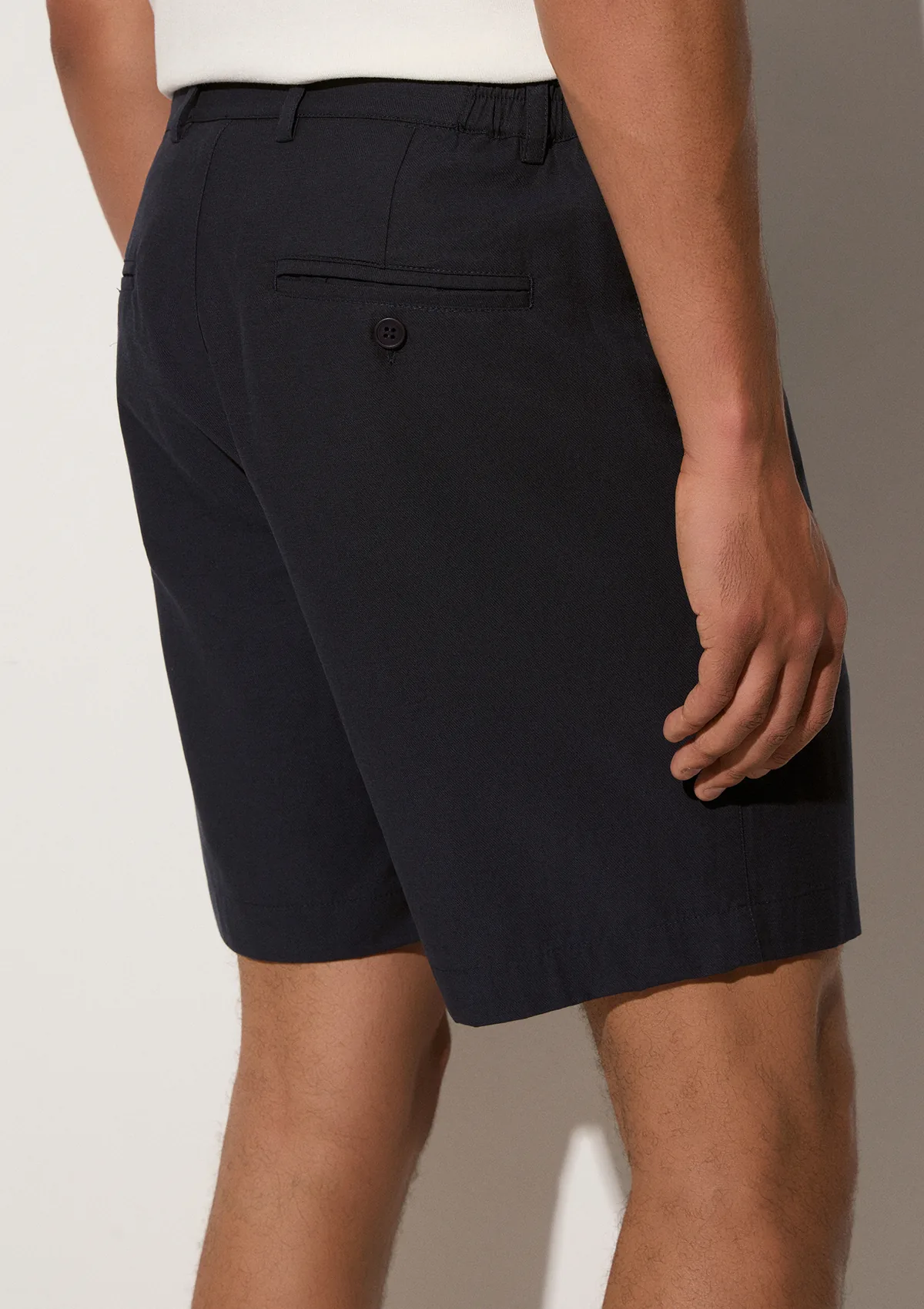 lorain-lyocell-shorts-navy-blue-lifestyle-side Lorain Lyocell Shorts - Navy Blue - Sea You Soon