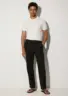 lunaro-lyocell-trousers-black-lifestyle-front Lunaro Lyocell Trousers - Black - Sea You Soon
