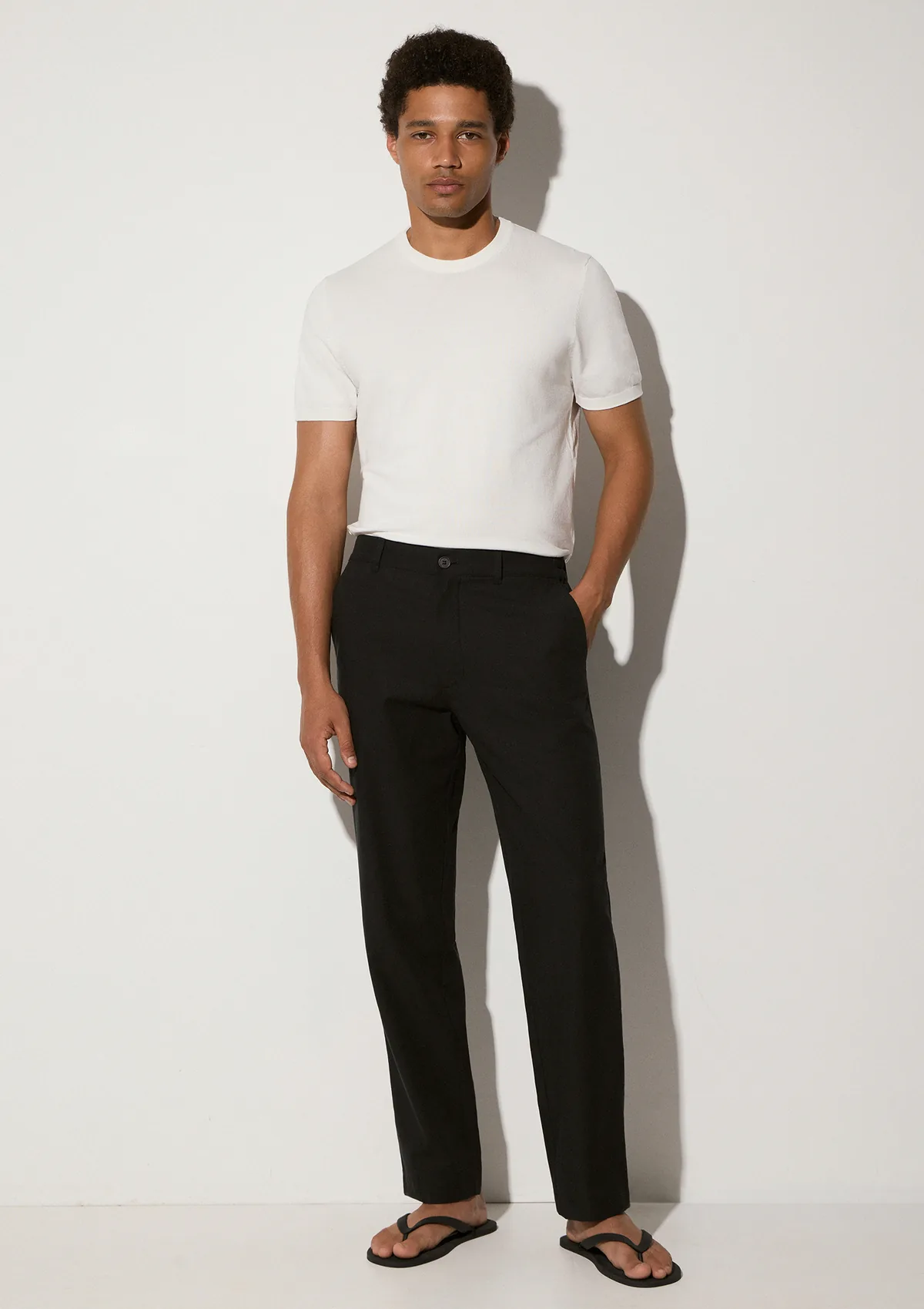 lunaro-lyocell-trousers-black-lifestyle-front Lunaro Lyocell Trousers - Black - Sea You Soon