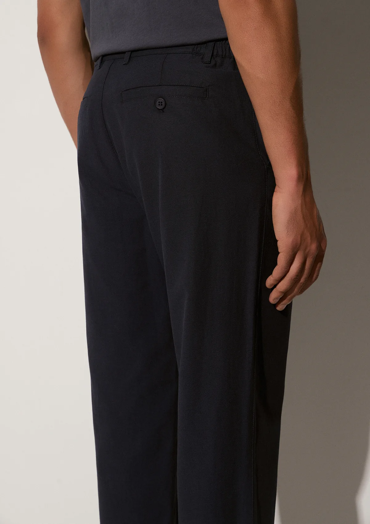 lunaro-lyocell-trousers-navy-blue-lifestyle-side Lunaro Lyocell Trousers - Navy Blue - Sea You Soon
