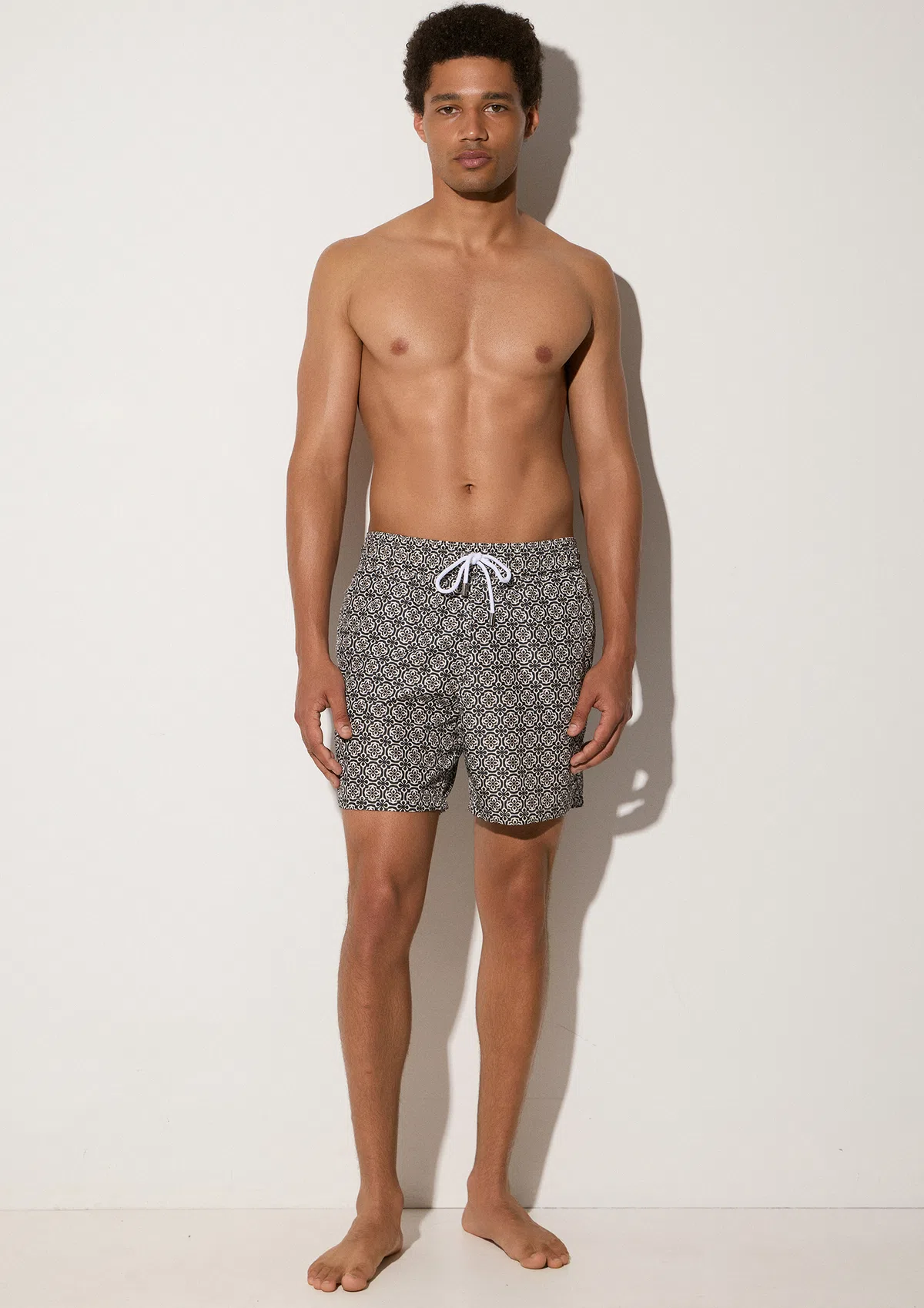 nara-polyester-swim-shorts-black-lifestyle-front Nara Swim Shorts - Black - Sea You Soon