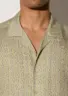 tamuda-tencel-shirt-pale-olive-detail Tamuda short sleeve shirt in Pale Olive showing TENCEL™ texture and hardware detail