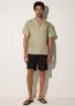 tamuda-tencel-shirt-pale-olive-lifestyle-front Additional angle of Tamuda TENCEL™ short sleeve shirt in Pale Olive on white background